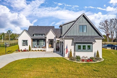 Welcome to Dogwood Drive where Modern Elegance Meets the on Southern Hills Golf and Country Club in Tennessee - for sale on GolfHomes.com, golf home, golf lot