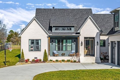 Welcome to Dogwood Drive where Modern Elegance Meets the on Southern Hills Golf and Country Club in Tennessee - for sale on GolfHomes.com, golf home, golf lot