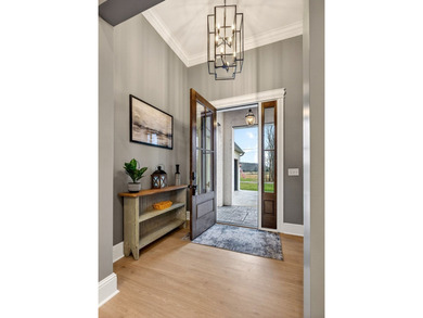 Welcome to Dogwood Drive where Modern Elegance Meets the on Southern Hills Golf and Country Club in Tennessee - for sale on GolfHomes.com, golf home, golf lot