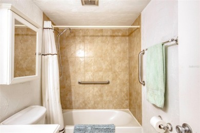 Enjoy easy living in this beautifully furnished 2-bedroom on Daytona Beach Golf Club in Florida - for sale on GolfHomes.com, golf home, golf lot