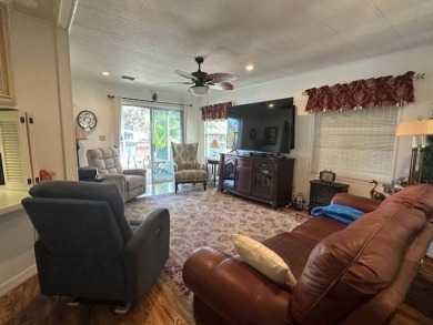 Beautifully Renovated 2-Bedroom, 2-Bath Home with Stunning Lake on Vista Plantation Golf Club in Florida - for sale on GolfHomes.com, golf home, golf lot