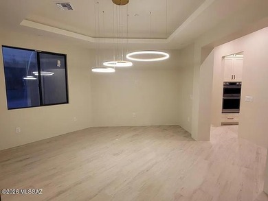 Recently completed new construction overlooking the 17th green on The Gallery Golf Club in Arizona - for sale on GolfHomes.com, golf home, golf lot