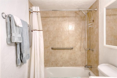 Enjoy easy living in this beautifully furnished 2-bedroom on Daytona Beach Golf Club in Florida - for sale on GolfHomes.com, golf home, golf lot