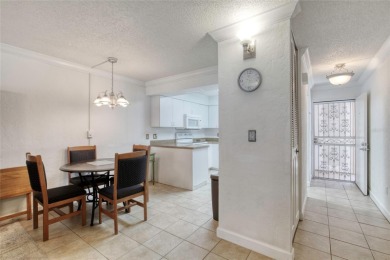 Enjoy easy living in this beautifully furnished 2-bedroom on Daytona Beach Golf Club in Florida - for sale on GolfHomes.com, golf home, golf lot
