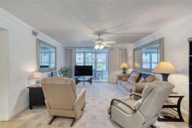 Enjoy easy living in this beautifully furnished 2-bedroom on Daytona Beach Golf Club in Florida - for sale on GolfHomes.com, golf home, golf lot