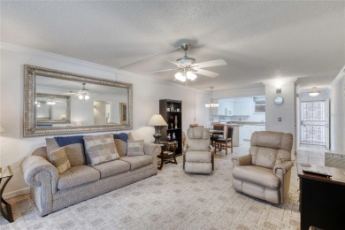 Enjoy easy living in this beautifully furnished 2-bedroom on Daytona Beach Golf Club in Florida - for sale on GolfHomes.com, golf home, golf lot
