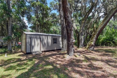 Nestled in the heart of Shellman Bluff, this two bedroom/two on Sapelo Hammock Golf Club in Georgia - for sale on GolfHomes.com, golf home, golf lot