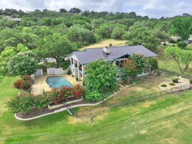 Discover your dream home nestled on the Slick Rock #12 fairway on Slick Rock Golf Course - Horseshoe Bay in Texas - for sale on GolfHomes.com, golf home, golf lot