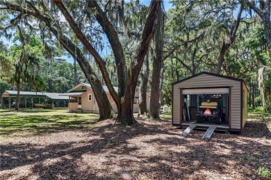 Nestled in the heart of Shellman Bluff, this two bedroom/two on Sapelo Hammock Golf Club in Georgia - for sale on GolfHomes.com, golf home, golf lot