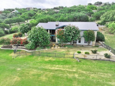 Discover your dream home nestled on the Slick Rock #12 fairway on Slick Rock Golf Course - Horseshoe Bay in Texas - for sale on GolfHomes.com, golf home, golf lot