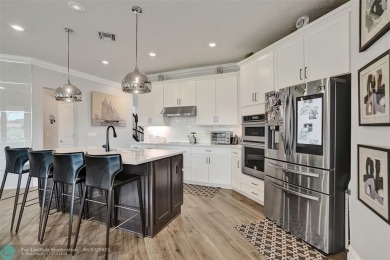 Check out this lovely, five-bedroom, three-bathroom home. This on Woodmont Country Club in Florida - for sale on GolfHomes.com, golf home, golf lot