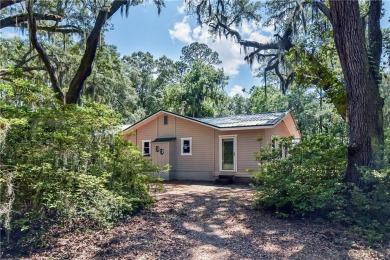 Nestled in the heart of Shellman Bluff, this two bedroom/two on Sapelo Hammock Golf Club in Georgia - for sale on GolfHomes.com, golf home, golf lot