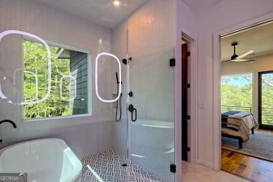 Situated on a private cul-de-sac within the esteemed Waterfall on Waterfall Country Club in Georgia - for sale on GolfHomes.com, golf home, golf lot