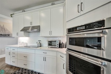 Check out this lovely, five-bedroom, three-bathroom home. This on Woodmont Country Club in Florida - for sale on GolfHomes.com, golf home, golf lot