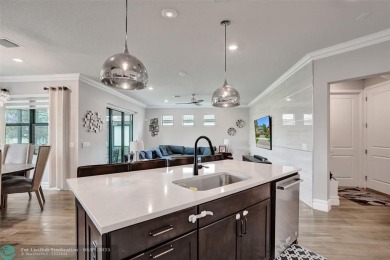 Check out this lovely, five-bedroom, three-bathroom home. This on Woodmont Country Club in Florida - for sale on GolfHomes.com, golf home, golf lot