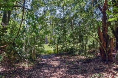 Nestled in the heart of Shellman Bluff, this two bedroom/two on Sapelo Hammock Golf Club in Georgia - for sale on GolfHomes.com, golf home, golf lot