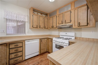 Beautifully situated on the edge of The Chaparral Golf Course on Chaparral Golf and Country Club in Arizona - for sale on GolfHomes.com, golf home, golf lot