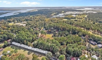 Nestled in the heart of Shellman Bluff, this two bedroom/two on Sapelo Hammock Golf Club in Georgia - for sale on GolfHomes.com, golf home, golf lot