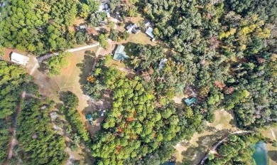Nestled in the heart of Shellman Bluff, this two bedroom/two on Sapelo Hammock Golf Club in Georgia - for sale on GolfHomes.com, golf home, golf lot