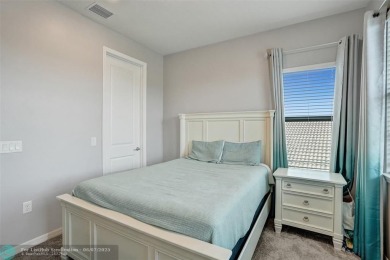 Check out this lovely, five-bedroom, three-bathroom home. This on Woodmont Country Club in Florida - for sale on GolfHomes.com, golf home, golf lot