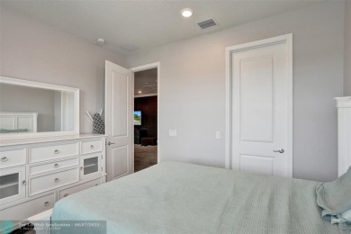 Check out this lovely, five-bedroom, three-bathroom home. This on Woodmont Country Club in Florida - for sale on GolfHomes.com, golf home, golf lot