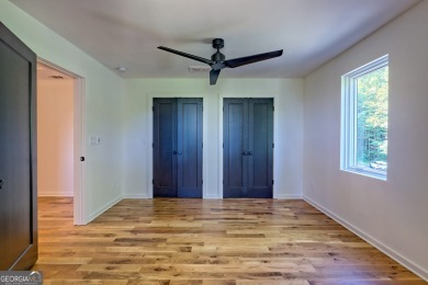 Situated on a private cul-de-sac within the esteemed Waterfall on Waterfall Country Club in Georgia - for sale on GolfHomes.com, golf home, golf lot