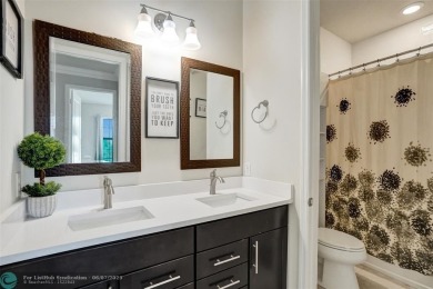 Check out this lovely, five-bedroom, three-bathroom home. This on Woodmont Country Club in Florida - for sale on GolfHomes.com, golf home, golf lot