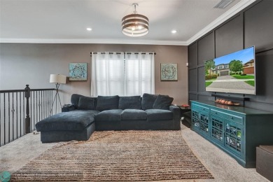 Check out this lovely, five-bedroom, three-bathroom home. This on Woodmont Country Club in Florida - for sale on GolfHomes.com, golf home, golf lot