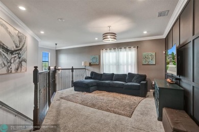 Check out this lovely, five-bedroom, three-bathroom home. This on Woodmont Country Club in Florida - for sale on GolfHomes.com, golf home, golf lot