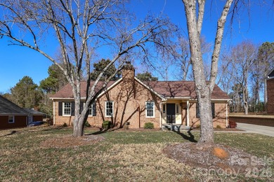 Handsome Raintree one level home that is almost full brick on Raintree Country Club in North Carolina - for sale on GolfHomes.com, golf home, golf lot