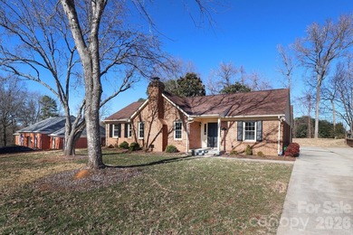 Handsome Raintree one level home that is almost full brick on Raintree Country Club in North Carolina - for sale on GolfHomes.com, golf home, golf lot