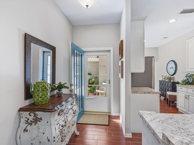 Enjoy expansive golf course views from this beautifully updated on Pelican Pointe Golf and Country Club in Florida - for sale on GolfHomes.com, golf home, golf lot