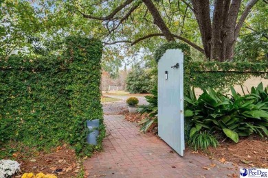 FLORENCE COUNTRY CLUB *The Secret Garden*   A charming cottage on Florence Country Club in South Carolina - for sale on GolfHomes.com, golf home, golf lot