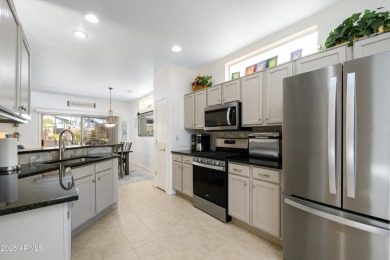 2 Bedroom plus Den located in The Grand. Granite counter tops on Sun City Grand Golf Couse and Club in Arizona - for sale on GolfHomes.com, golf home, golf lot