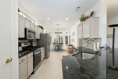 2 Bedroom plus Den located in The Grand. Granite counter tops on Sun City Grand Golf Couse and Club in Arizona - for sale on GolfHomes.com, golf home, golf lot
