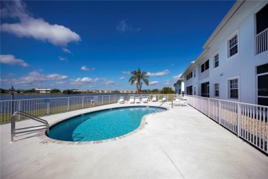 FIRST FLOOR, LAKE VIEW, END UNIT 2/2 PLUS French doors DEN condo on Deep Creek Golf Club in Florida - for sale on GolfHomes.com, golf home, golf lot