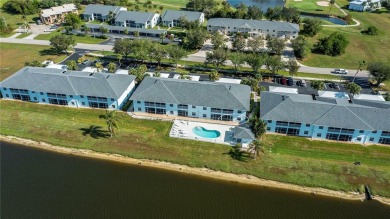 FIRST FLOOR, LAKE VIEW, END UNIT 2/2 PLUS French doors DEN condo on Deep Creek Golf Club in Florida - for sale on GolfHomes.com, golf home, golf lot