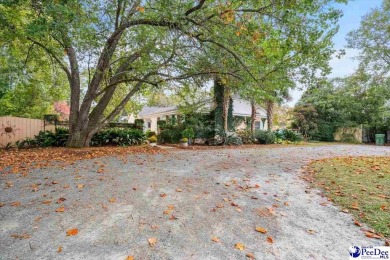 FLORENCE COUNTRY CLUB *The Secret Garden*   A charming cottage on Florence Country Club in South Carolina - for sale on GolfHomes.com, golf home, golf lot