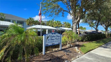 FIRST FLOOR, LAKE VIEW, END UNIT 2/2 PLUS French doors DEN condo on Deep Creek Golf Club in Florida - for sale on GolfHomes.com, golf home, golf lot