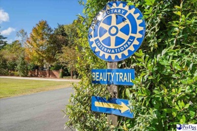 FLORENCE COUNTRY CLUB *The Secret Garden*   A charming cottage on Florence Country Club in South Carolina - for sale on GolfHomes.com, golf home, golf lot