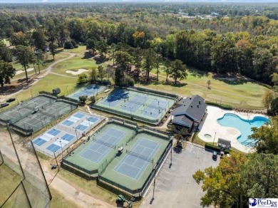 FLORENCE COUNTRY CLUB *The Secret Garden*   A charming cottage on Florence Country Club in South Carolina - for sale on GolfHomes.com, golf home, golf lot