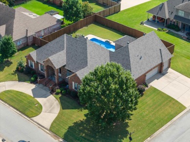 This one has it ALL! Situated on a large corner lot, this 4-bed on Centennial Valley Golf Course in Arkansas - for sale on GolfHomes.com, golf home, golf lot