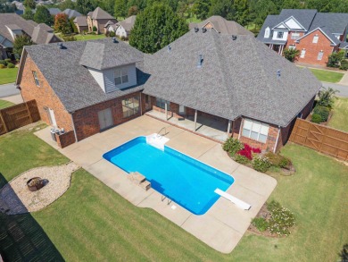 This one has it ALL! Situated on a large corner lot, this 4-bed on Centennial Valley Golf Course in Arkansas - for sale on GolfHomes.com, golf home, golf lot
