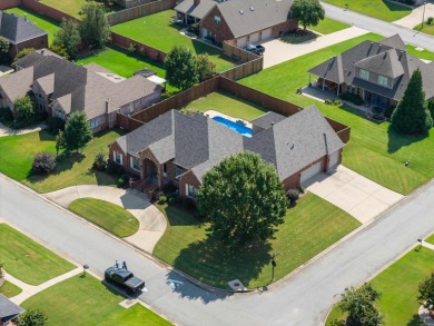 This one has it ALL! Situated on a large corner lot, this 4-bed on Centennial Valley Golf Course in Arkansas - for sale on GolfHomes.com, golf home, golf lot