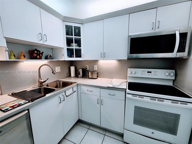 Beautifully maintained and spacious 1-bedroom, 1.5-bath unit on The Diplomat Golf Resort and Spa in Florida - for sale on GolfHomes.com, golf home, golf lot