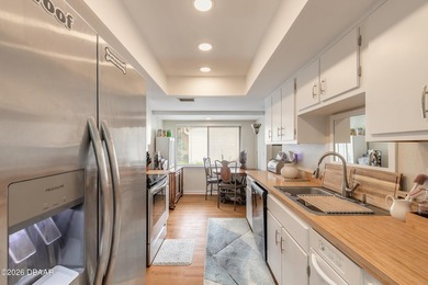 Located in the highly sought-after Sugar Mill Country Club on Sugar Mill Country Club in Florida - for sale on GolfHomes.com, golf home, golf lot