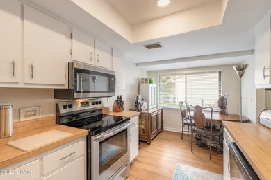 Located in the highly sought-after Sugar Mill Country Club on Sugar Mill Country Club in Florida - for sale on GolfHomes.com, golf home, golf lot