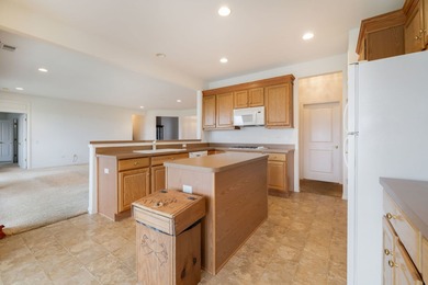 Welcome to this sought after Adler model in Del Webb Sun City on Whisper Creek Golf Club in Illinois - for sale on GolfHomes.com, golf home, golf lot