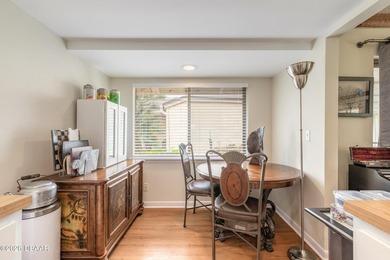 Located in the highly sought-after Sugar Mill Country Club on Sugar Mill Country Club in Florida - for sale on GolfHomes.com, golf home, golf lot