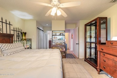 Located in the highly sought-after Sugar Mill Country Club on Sugar Mill Country Club in Florida - for sale on GolfHomes.com, golf home, golf lot